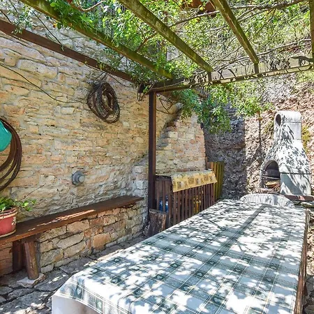 Holiday home Lovely In With Kitchen Lamon